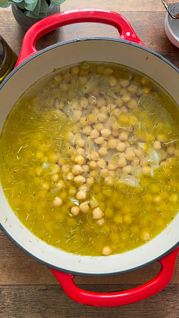 Adding the water to the pot.