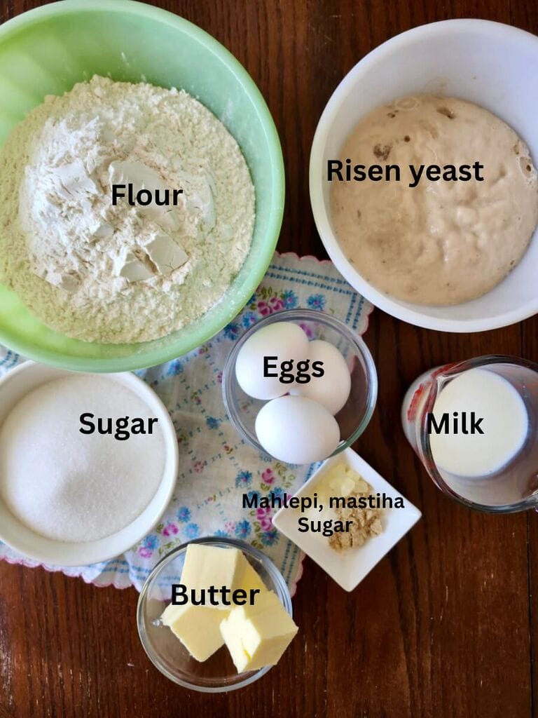 Ingredients for the Tsoureki, Greek sweet Easter bread, rolls or muffins, which include: Flour, yeast, water, sugar, eggs, milk, Mastiha, Mahlepi and butter.
