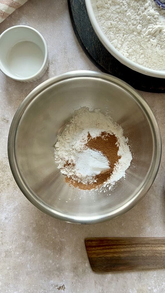 combining flour, baking powder, soda and salt.