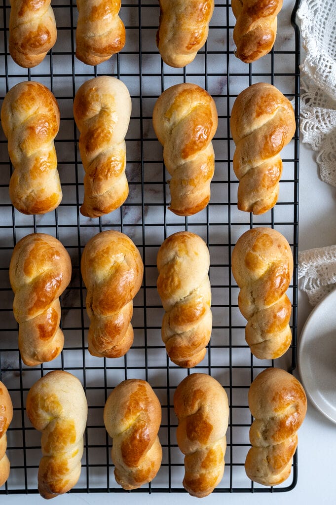 Koulourakia, cooling on a wire rack.