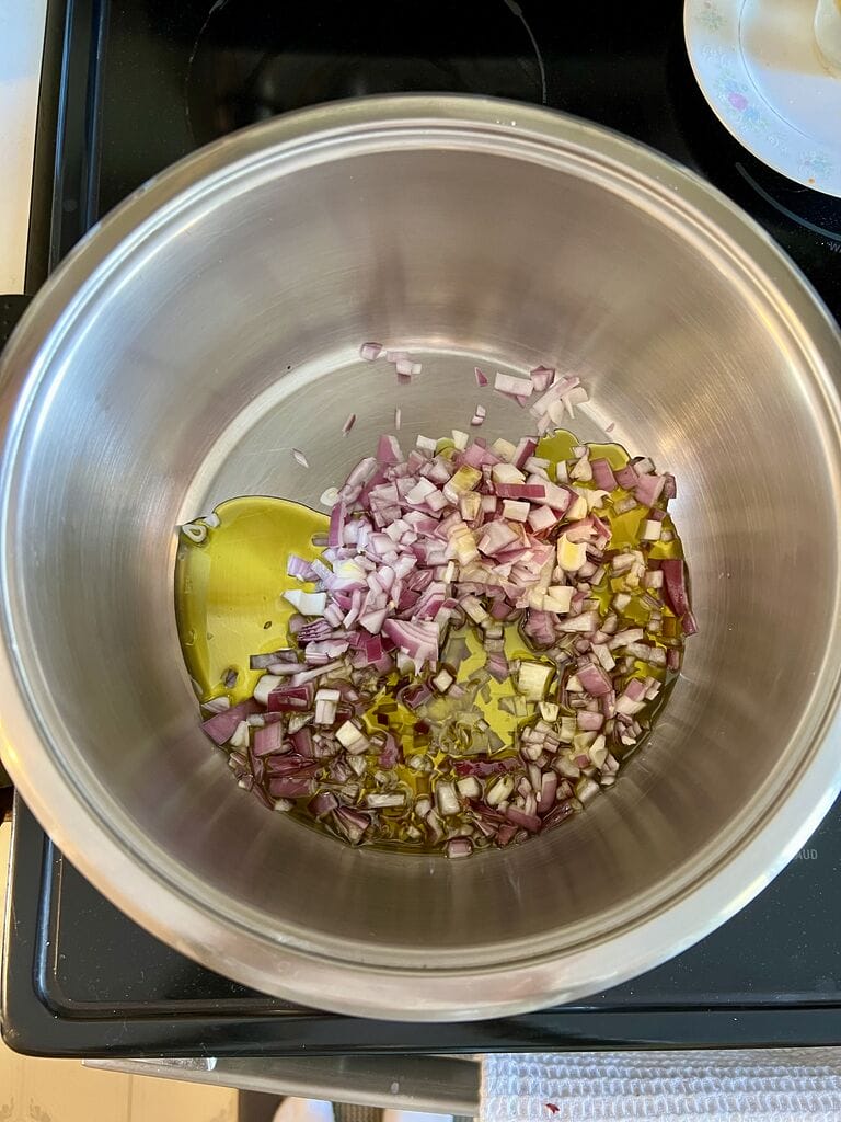 Sautéing the red onion.