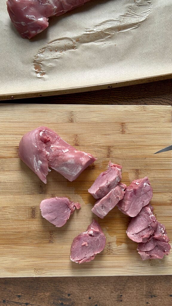 Slicing the pork tenderloin.
