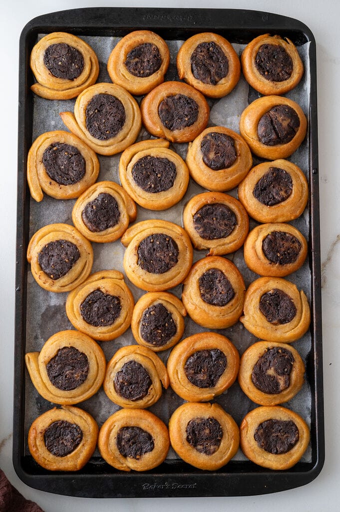 Roxakia cookies shown on a baking sheet.