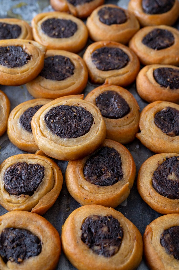 Roxakia cookies shown on a baking sheet.