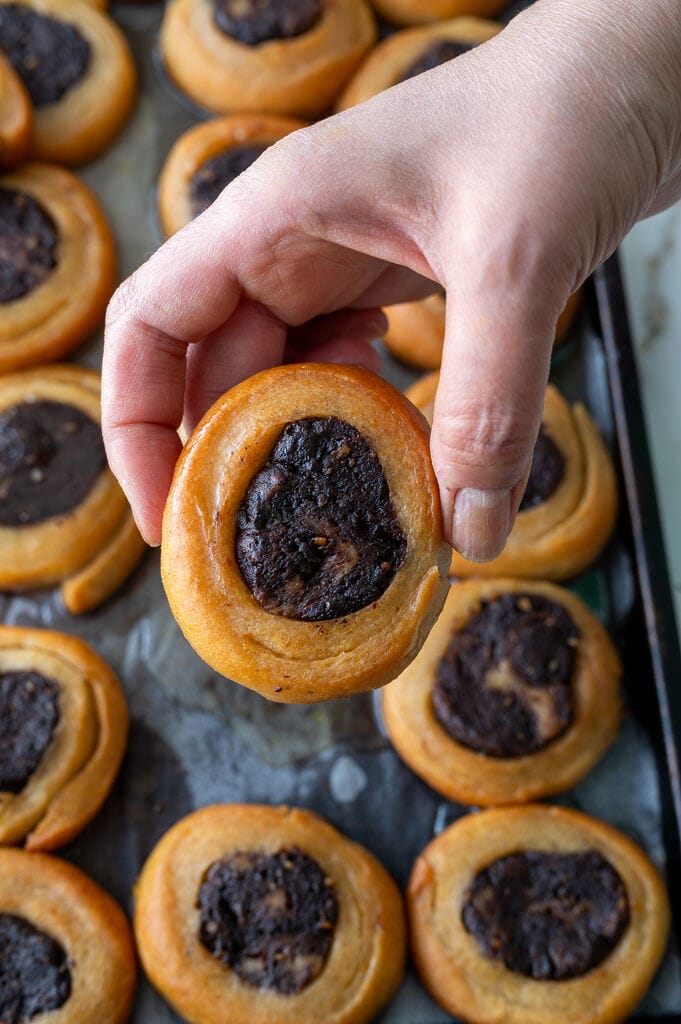 Holding up a Roxakia cookie.
