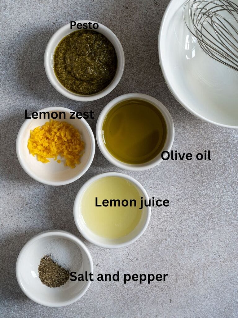Ingredients for the dressing which include Olive oil, lemon juice, lemon zest, pesto, salt and pepper.