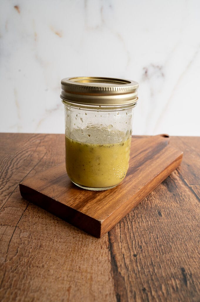 Greek salad dressing in a mason jar.