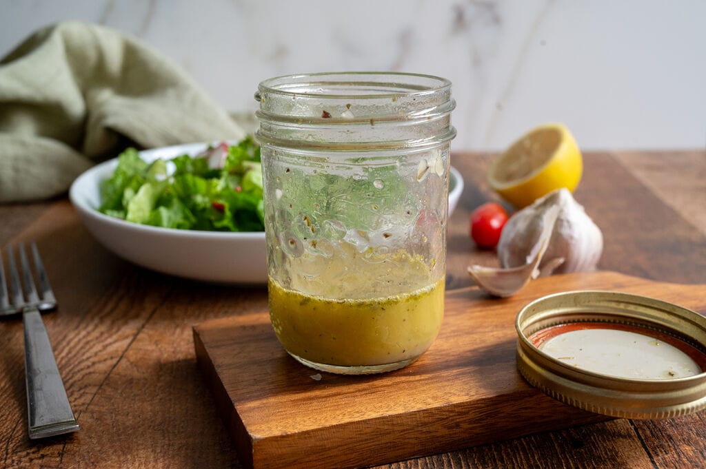 Greek salad dressing in a mason jar.