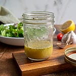 Greek salad dressing in a mason jar.