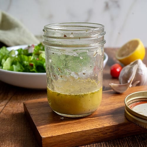 Greek salad dressing in a mason jar.