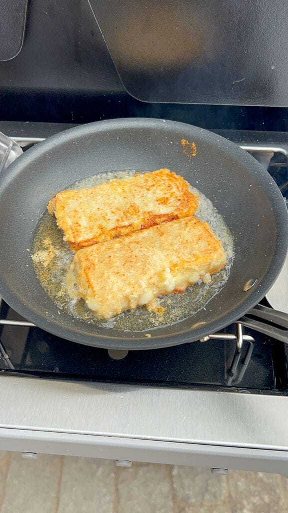 Frying the cheese saganaki.