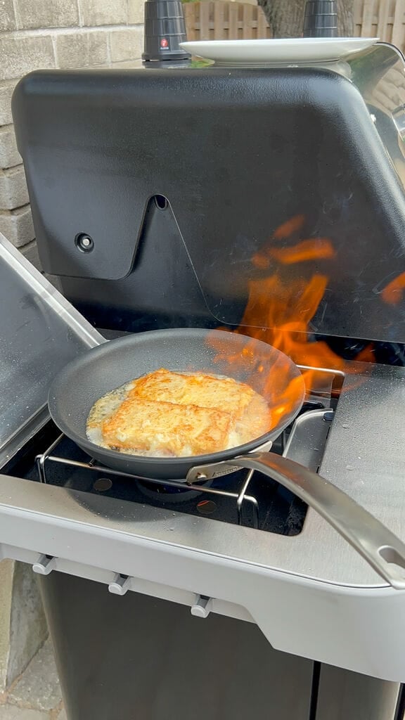 Flaming the cheese saganaki.