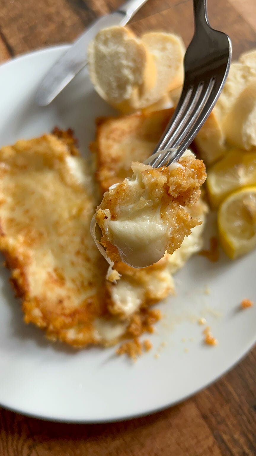Flaming Greek cheese saganaki, flambeed fried cheese - Mia Kouppa