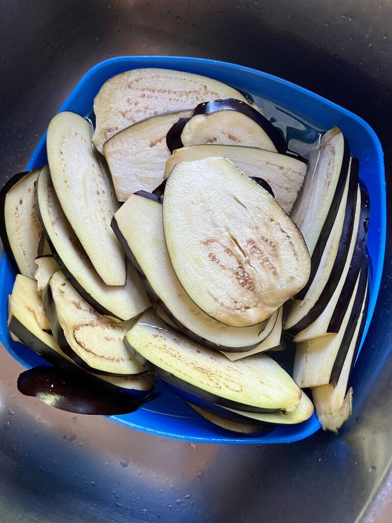Soaking the eggplant.