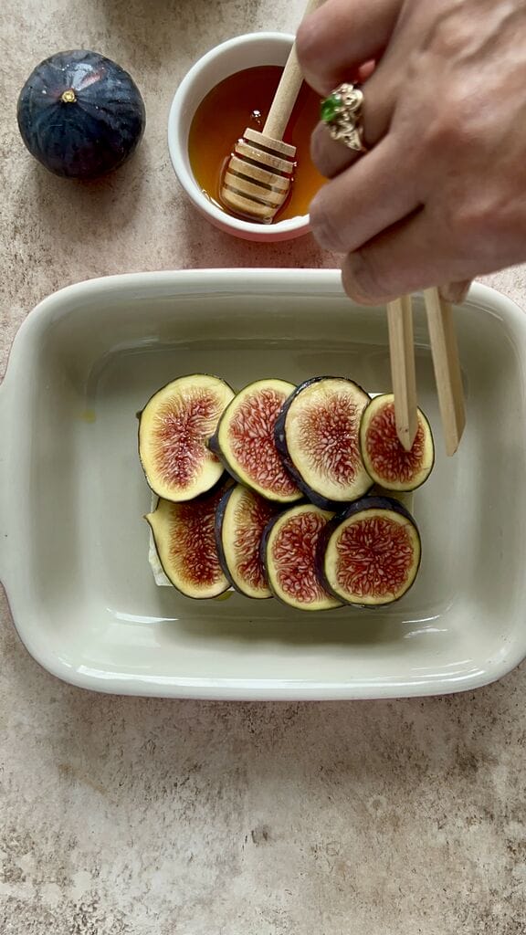 Layering the figs onto the feta.