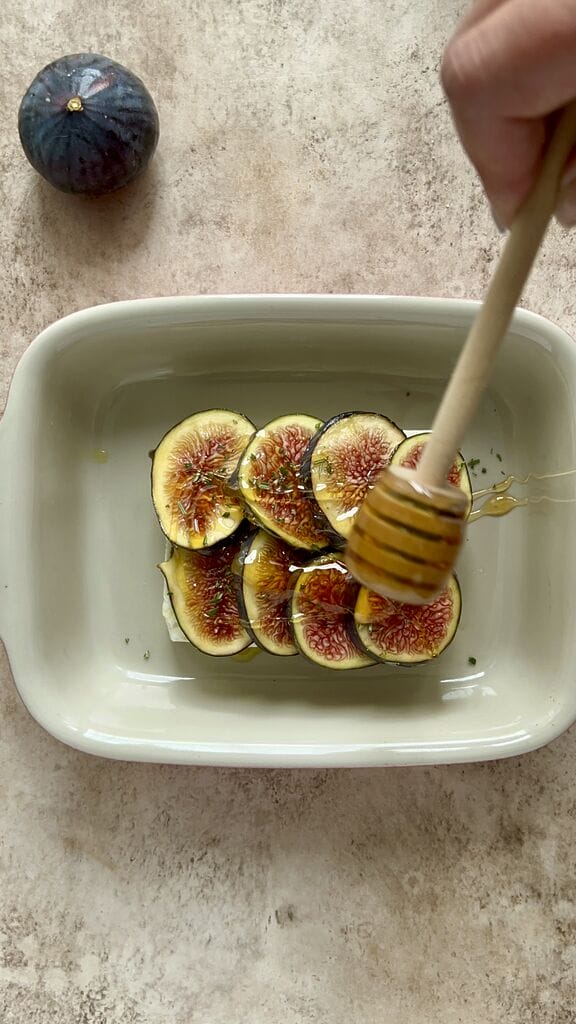topping the figs with honey