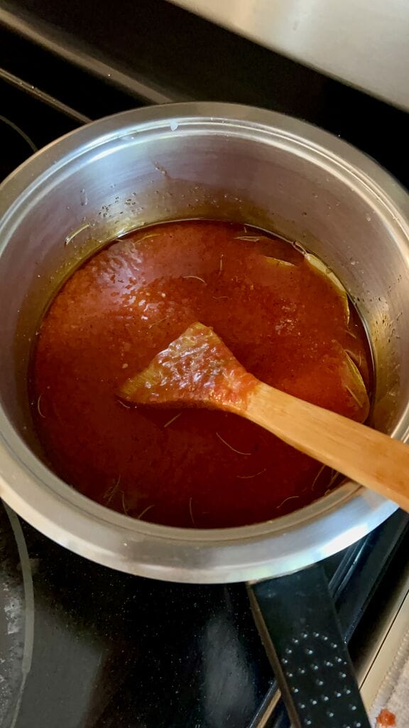 Making the tomato sauce.