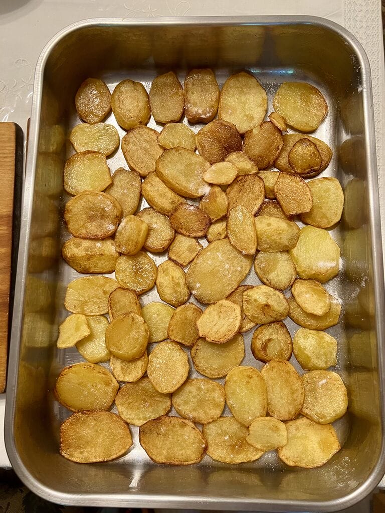 Layering the potatoes.
