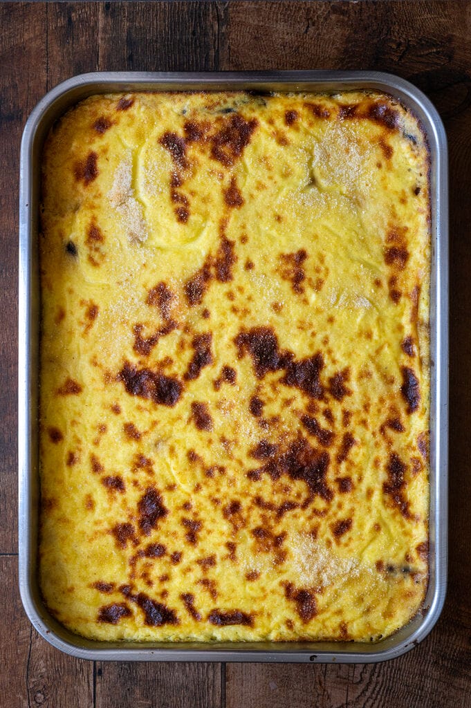 Moussaka in a stainless steel pan.