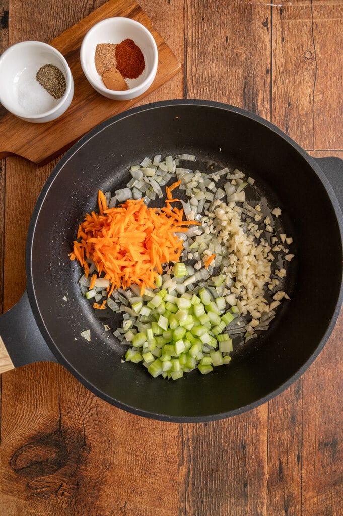 Frying the onion, celery, garlic and carrot