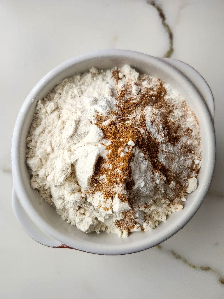 Combining the dry ingredients.