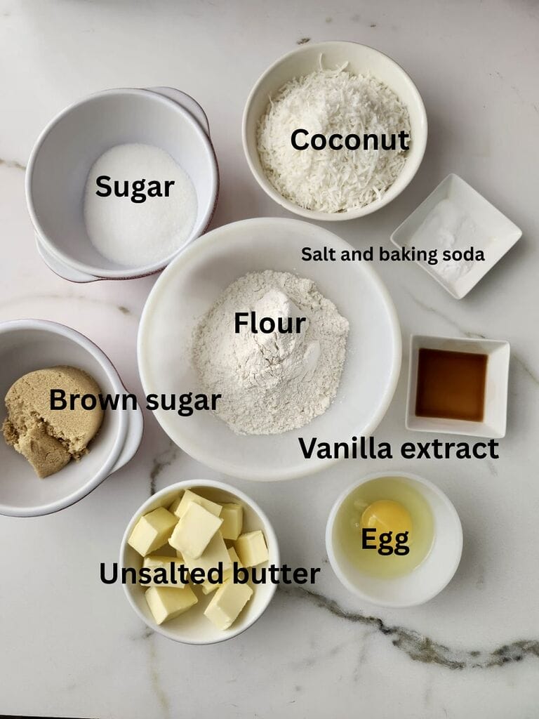 Ingredients for the cookies include: sugar, coconut, brown sugar, flour, baking soda, salt, egg, unsalted butter and vanilla extract.