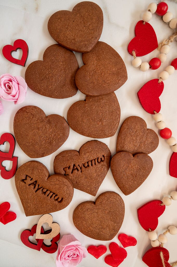 Chocolate cutout cookies on a white background.