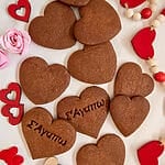 Chocolate cutout cookies on a white background.