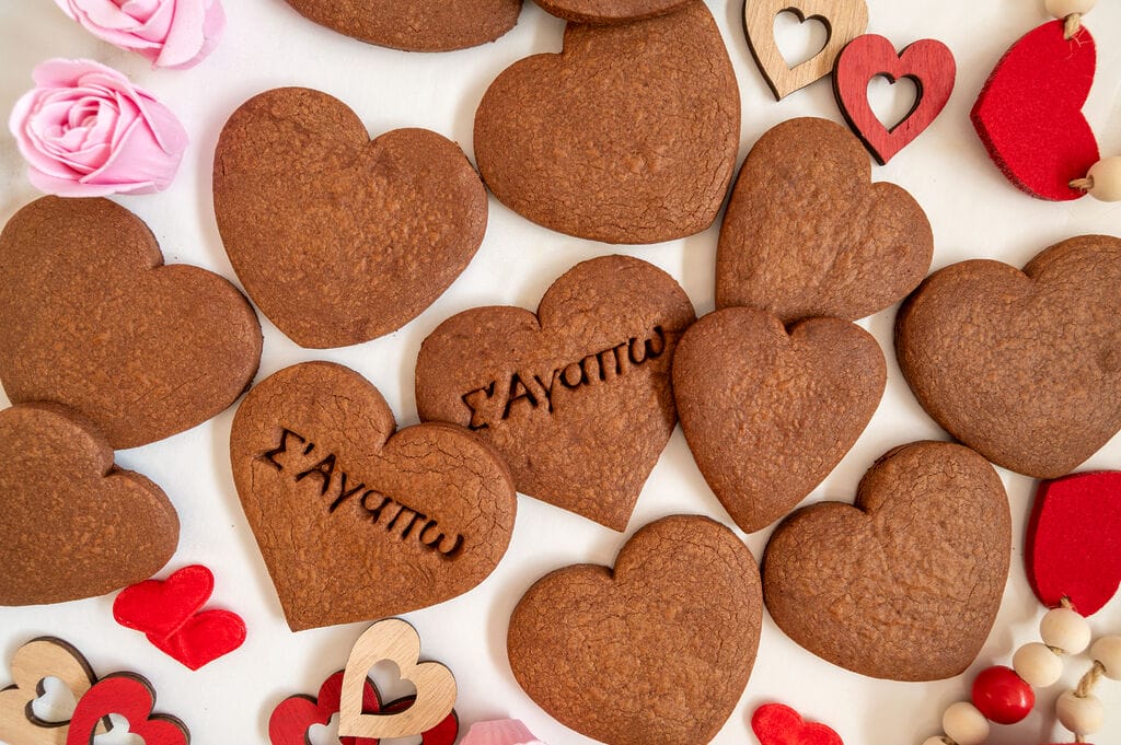 Chocolate cutout cookies on a white background.