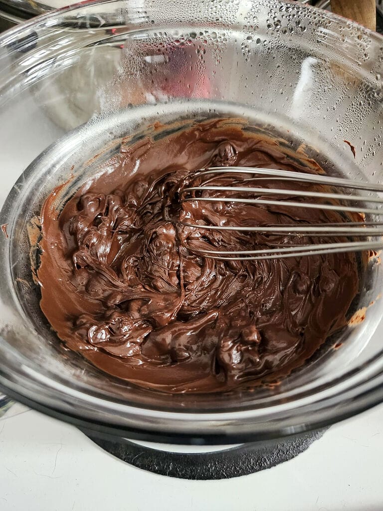 Melting the dark chocolate.