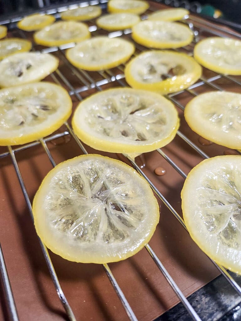 Draining the lemon slices.