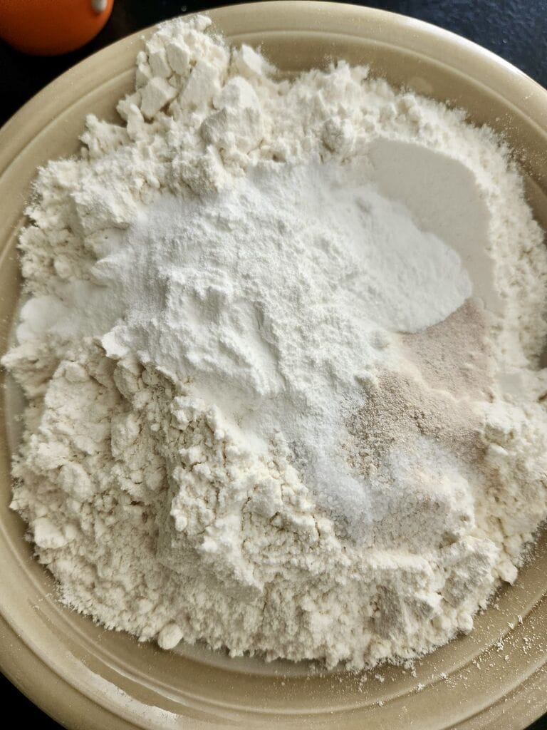 Combining the dry ingredients.