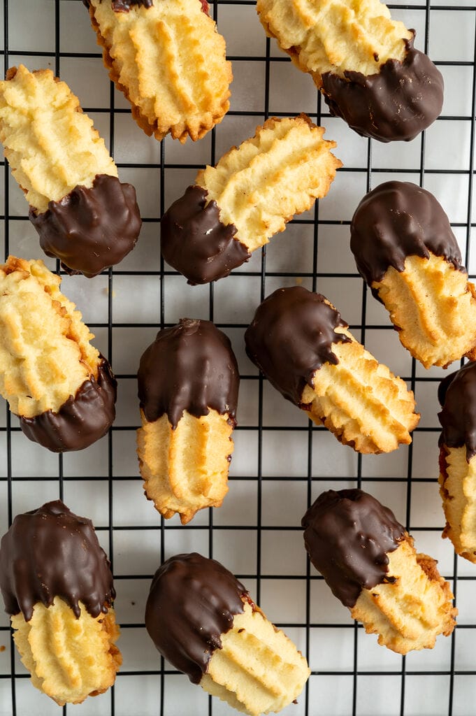 The cookies on a cooling rack.