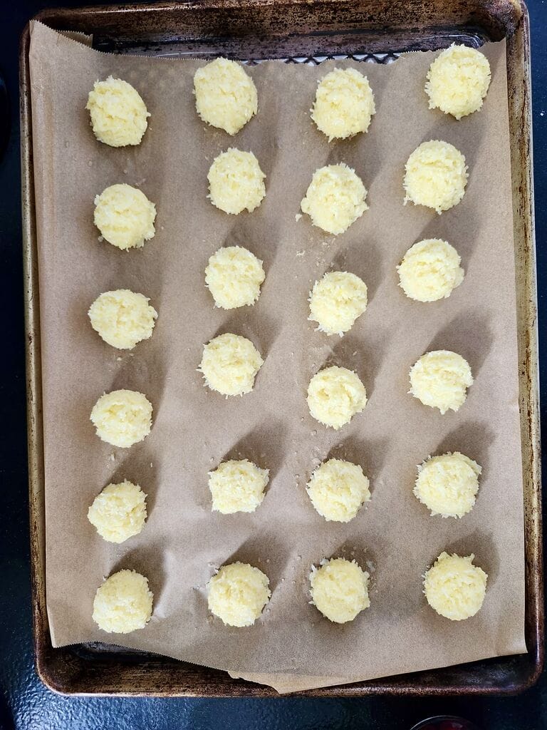 Cookies are formed into little balls.