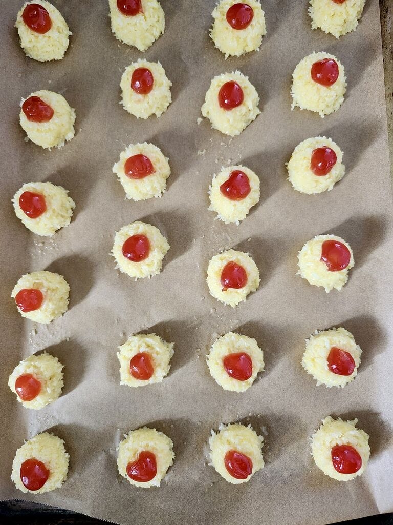 The cookies on a baking sheet, ready to bake.