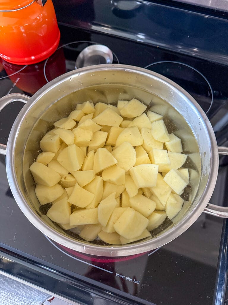 Boiling the potatoes.