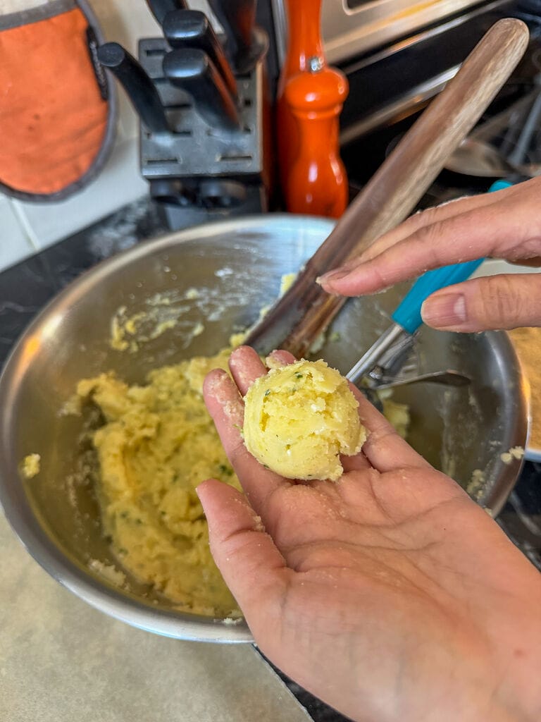 Shaping the fritters.