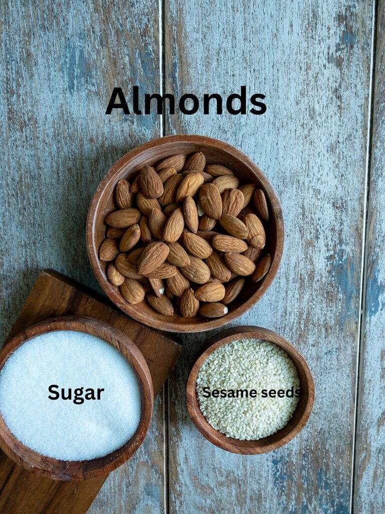 Ingredients which include: raw almonds, sugar, water and sesame seeds.