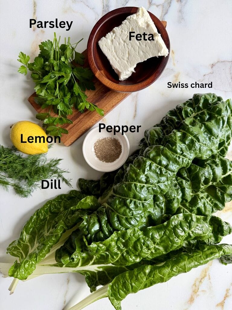 Ingredients include: Swiss chard, parsley dill , lemon, feta, and pepper.