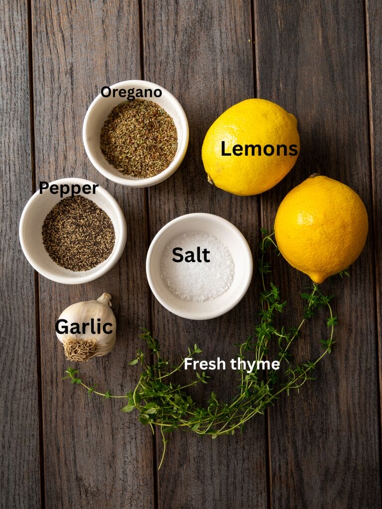 Ingredients include: Lemons, pepper, oregano, salt, fresh thyme, and garlic